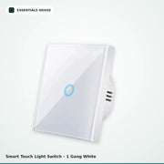 A 1-gang white smart touch light switch by Essentials House, featuring a glossy white faceplate with a blue circular