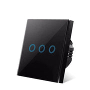 Black glass-panel touch light switch with three blue circular touch buttons, shown at an angle on a white background.