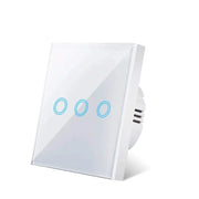 White glass-panel touch light switch with three blue circular touch buttons, shown at an angle on a white background.