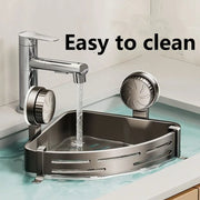 Gray suction shower basket rinsed under running water