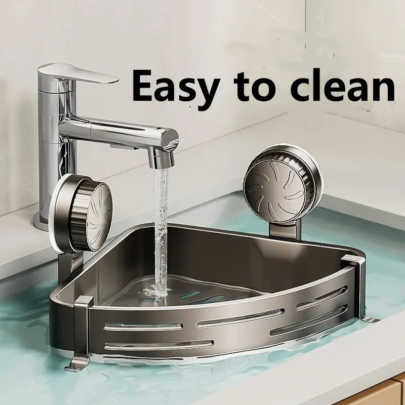 Gray suction shower basket rinsed under running water