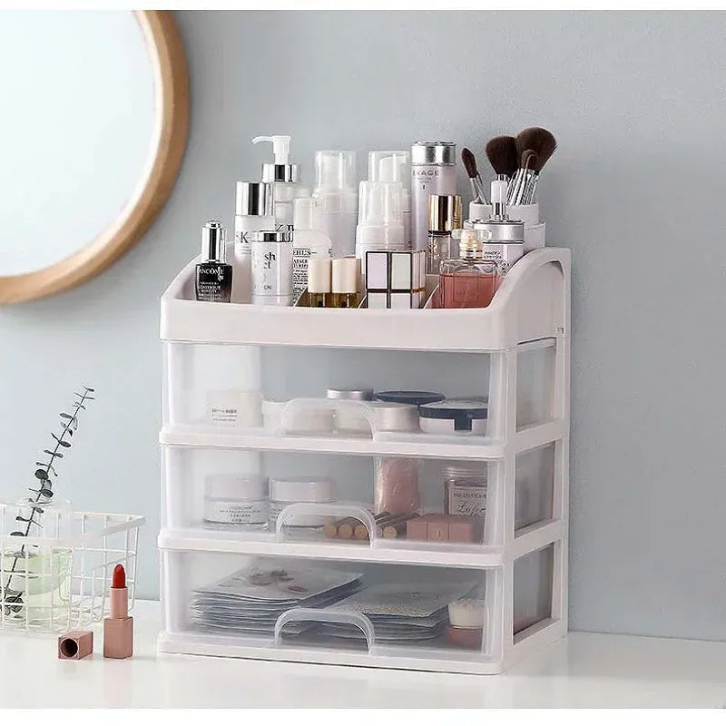 Clear makeup and jewelry organizer beside a vanity mirror