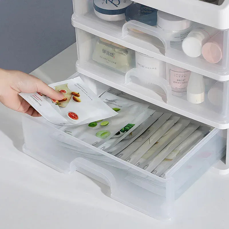 Pull-out drawer holding makeup palettes and small cosmetics