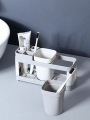 Removable rinse cup beside the toothbrush holder