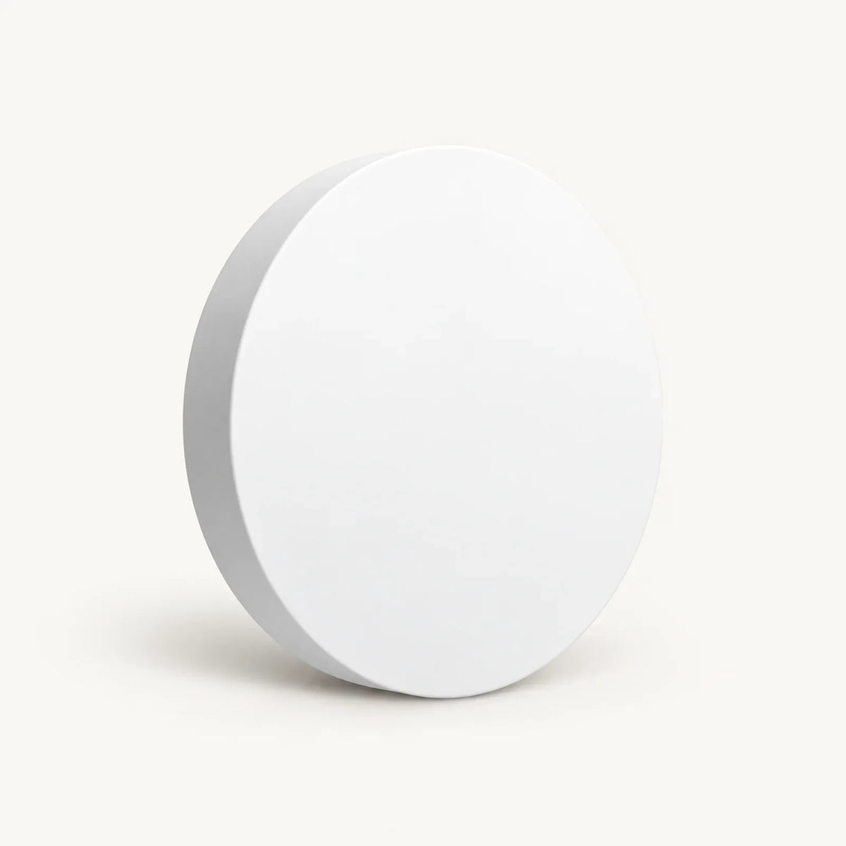 White round Tuya Zigbee scene button shown at an angle on a warm off-white background.