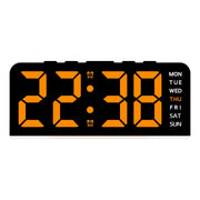 Black case digital alarm clock with orange digits and white weekday labels