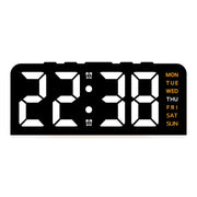 Black case digital alarm clock with white digits and orange weekday labels