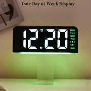 Date and weekday display feature on digital alarm clock with green mood light