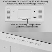 Rear battery compartment and top control buttons on digital alarm clock