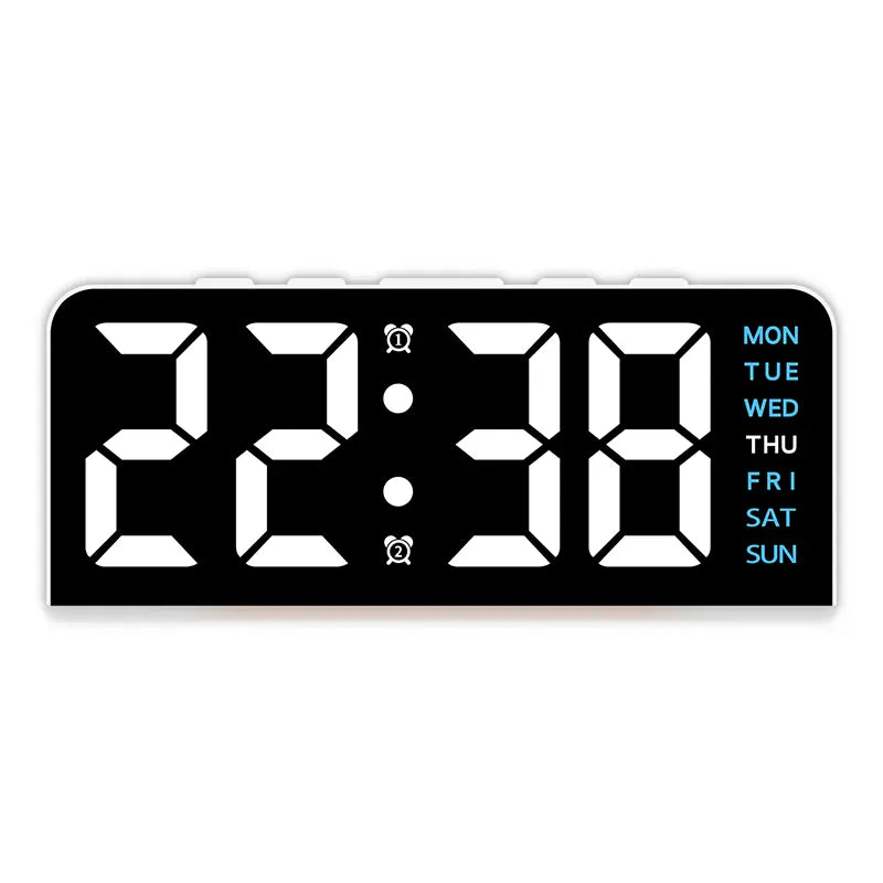 White case digital alarm clock with white digits and blue weekday labels