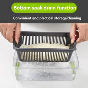 Removable draining basket lifted from the vegetable chopper collection container