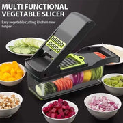 Vegetable chopper with clear container alongside bowls of prepared vegetables