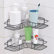 Two black corner shelves holding bathroom toiletries