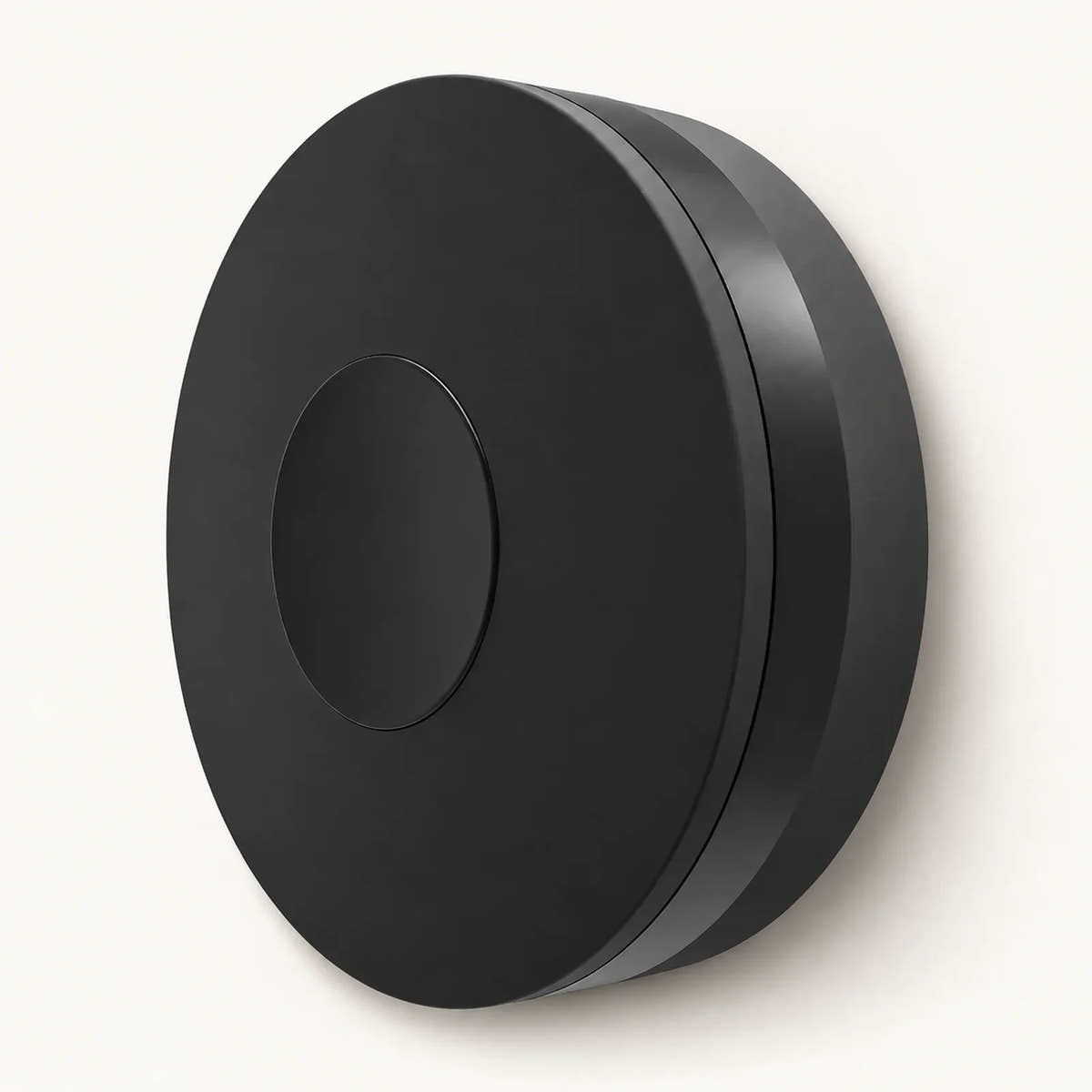 Single black circular WiFi IR/RF remote hub shown at an angle on a warm off-white background.