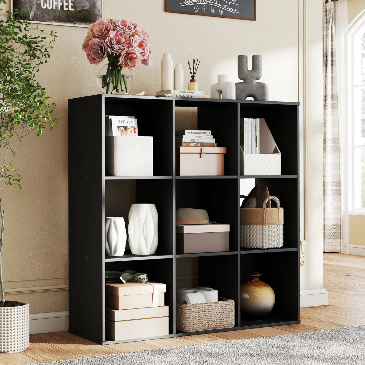 Black nine-cube storage bookcase styled with books and decor